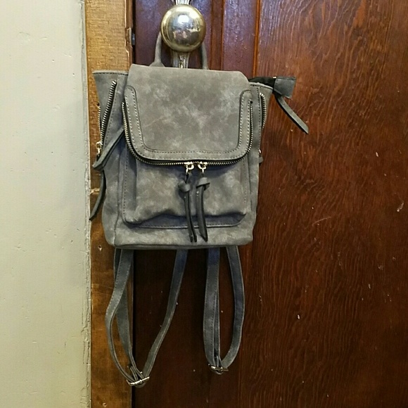 Handbags - Mini faux leather backpack super cute!